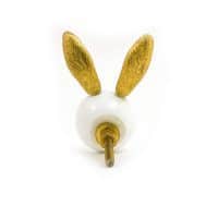 DSC 3697 gold rabbit and white glass knob